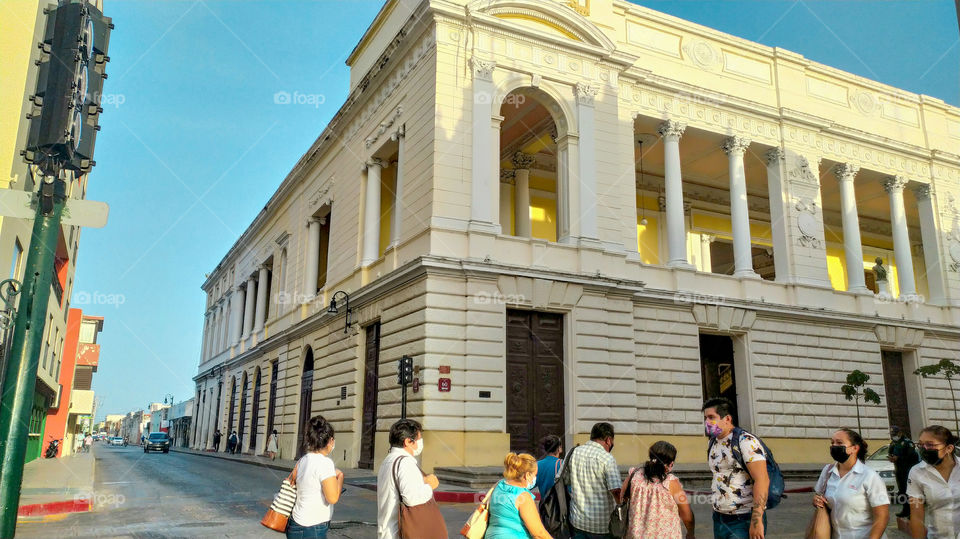 city ​​streets with people and buildings