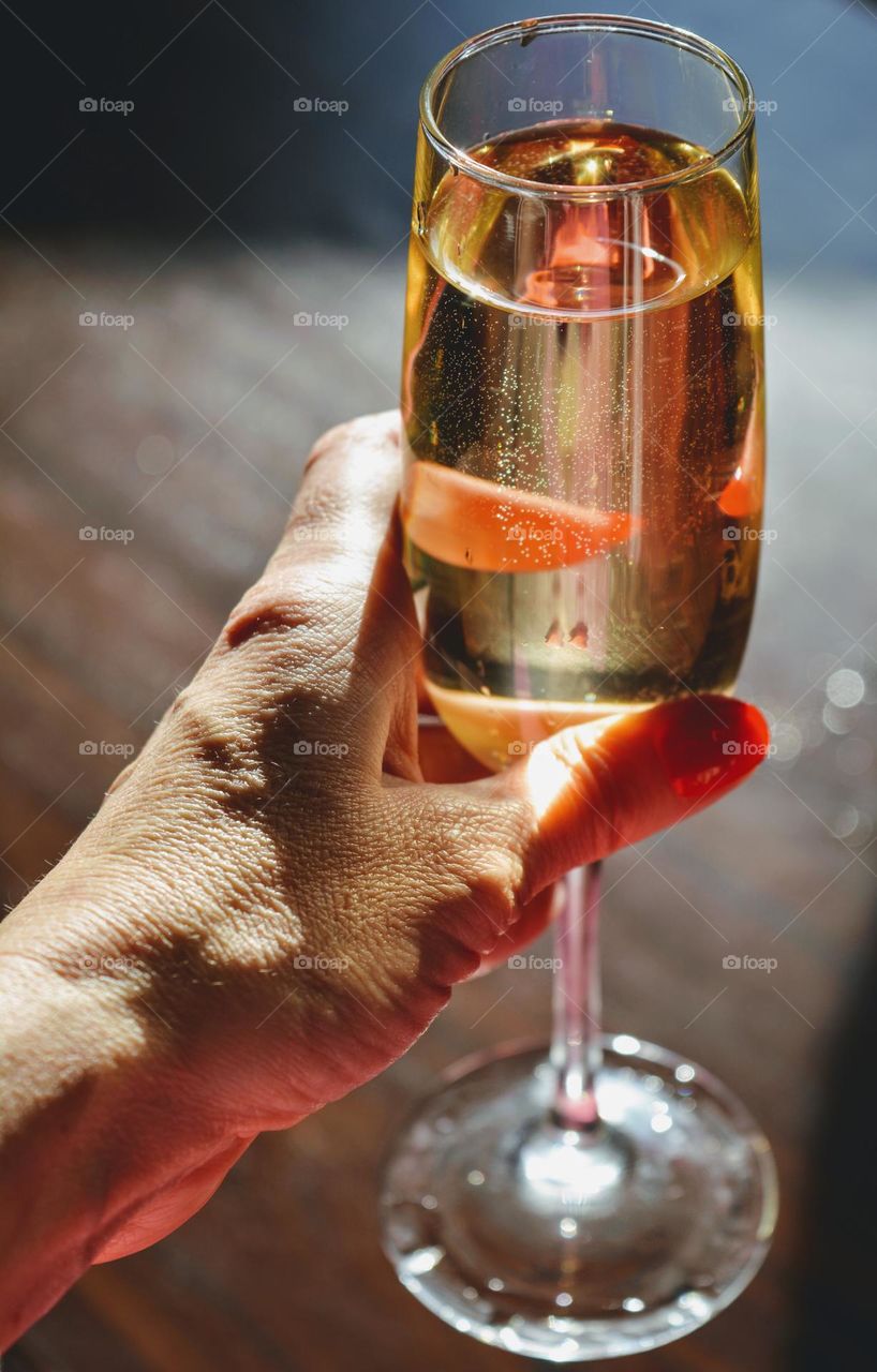 champagne in the female hand