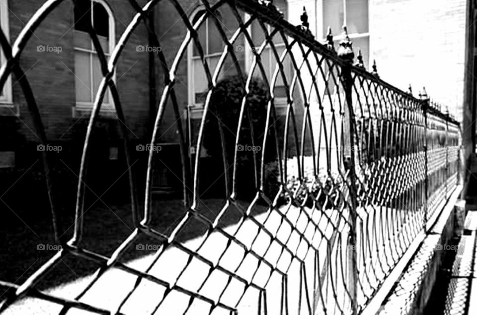 Fence. The fence was part of the building structure.