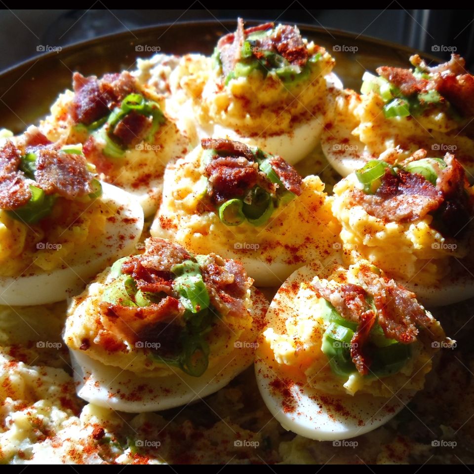 Fully loaded bacon & onion deviled eggs over potato salad. Who’s in for a picnic?