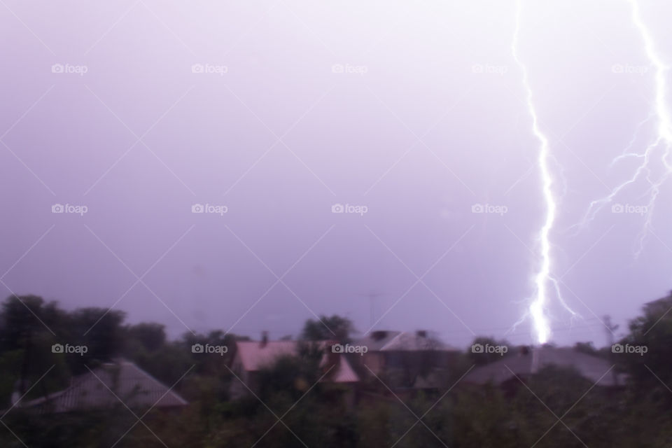 storm with thunder, lightning and rain