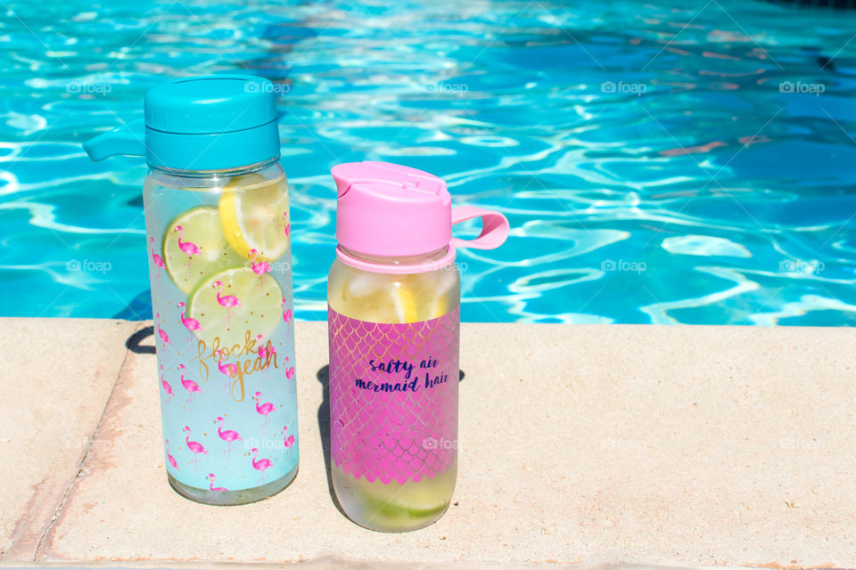 Water bottles by the pool