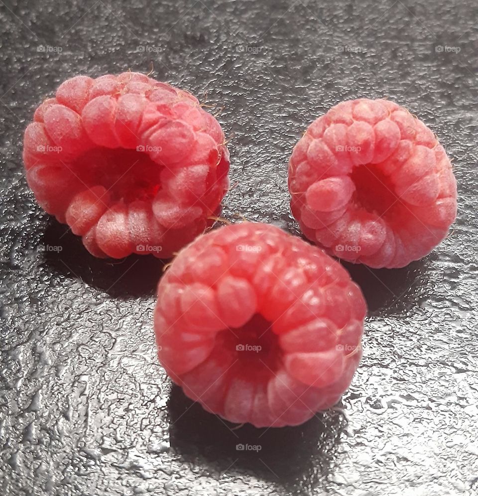 three tasty raspberries reminding us about sunny days 😋