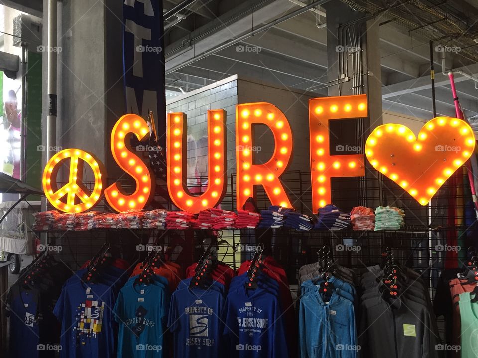 Neon sign peace sign heart surf