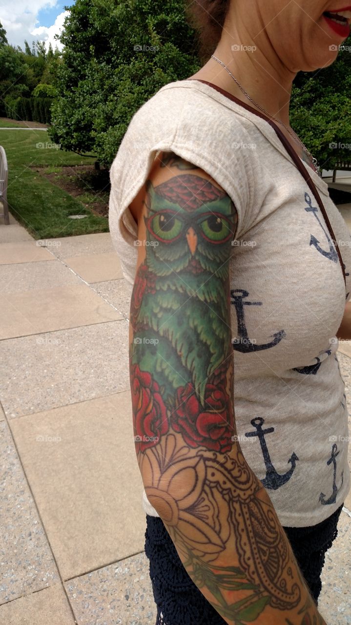 Owl tattoo has such brilliant and vibrant colors such beautiful work