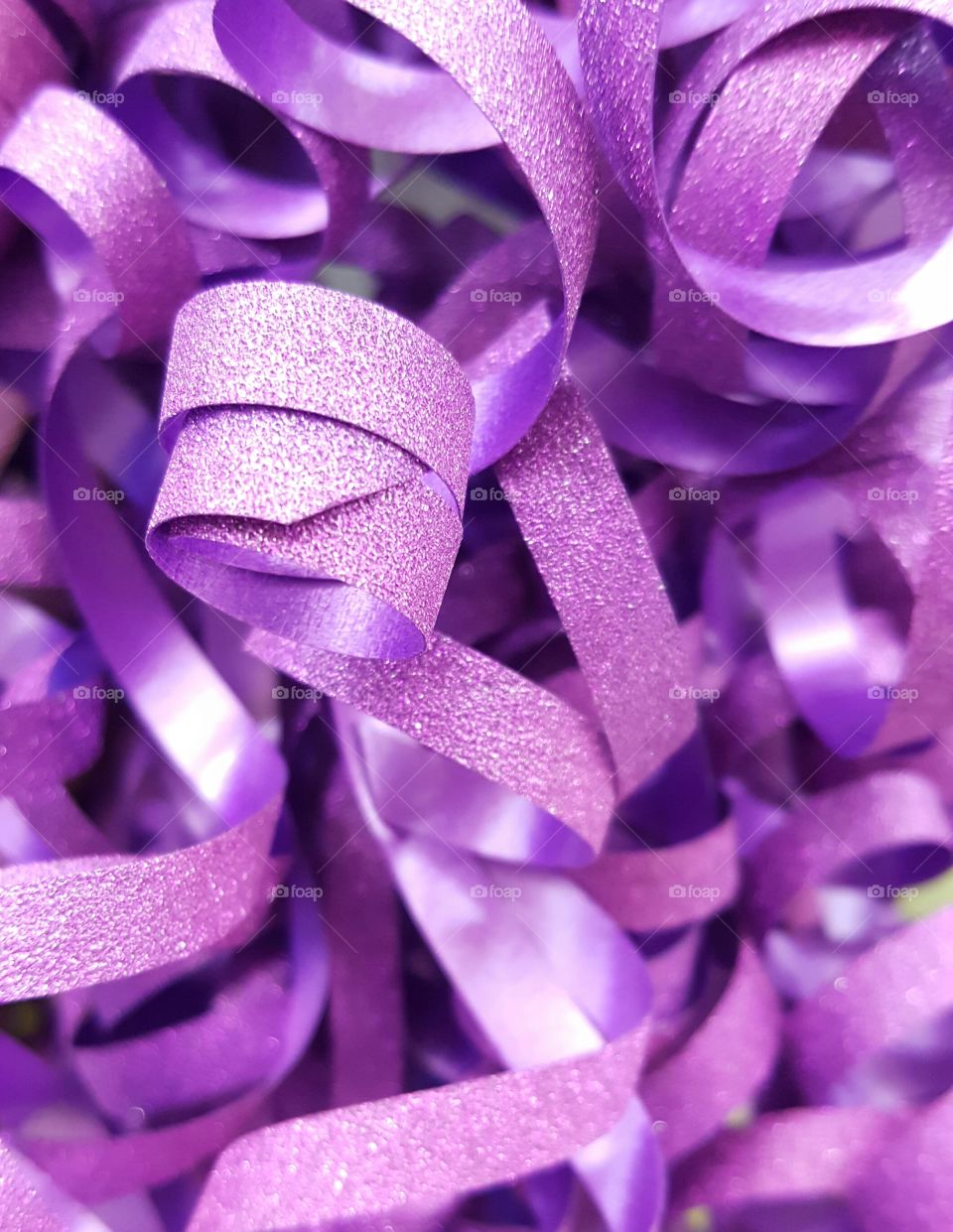 Purple curly ribbon