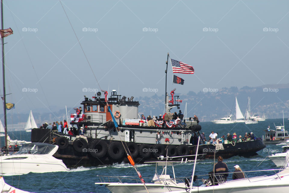 Giants tugboat. Tugboat in San Francisco Bay celebrating fleet week, Americas cup race and Giants World Series 2012