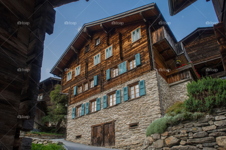 old wooden house in the swiss alps 