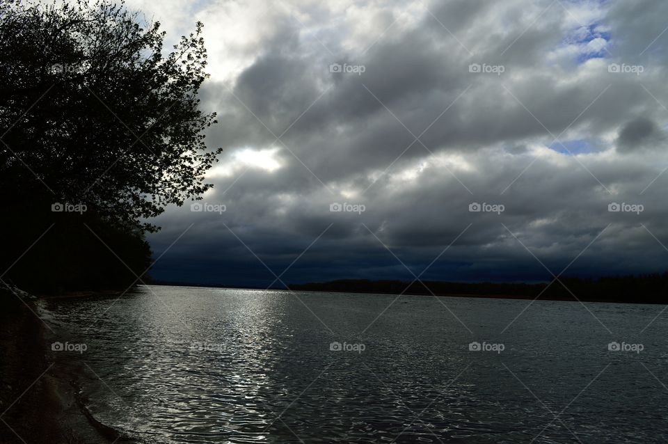 cloudy spring evening on the river