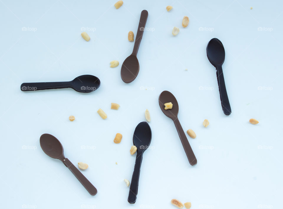 Chocolate spoons with peanuts