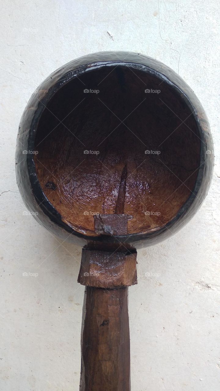 The ancient dipper is made of coconut skin and wood