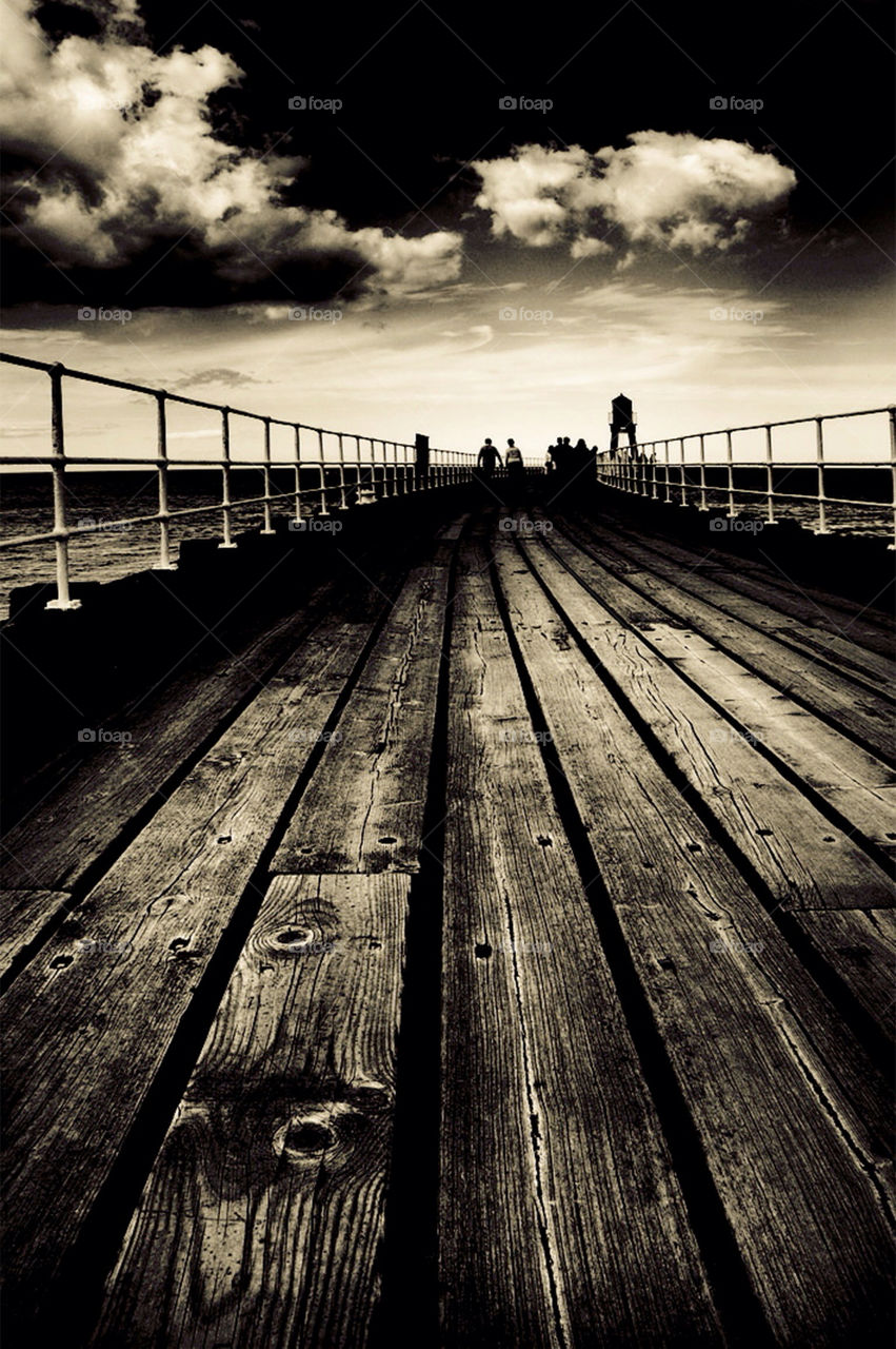 people wood pier dramatic by jbrinkler