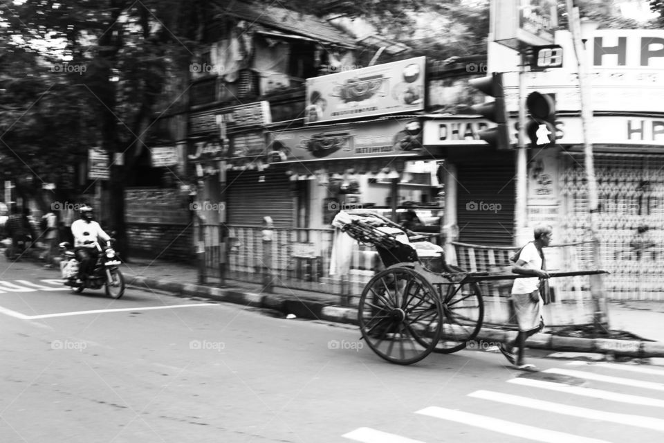 Man ahead of Machine - Vintage Kolkata hand pulled rickshaw