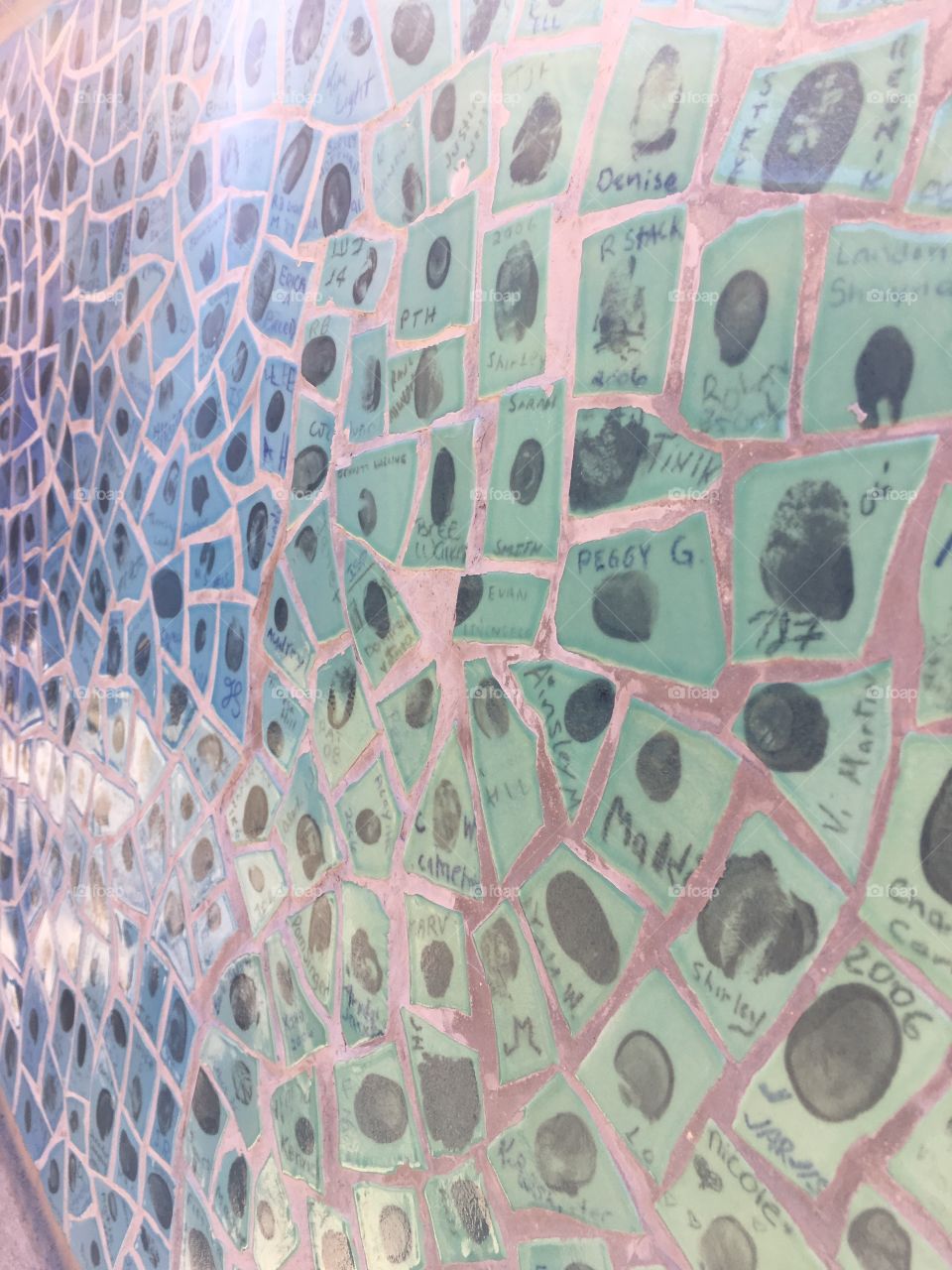 Fingerprints on ceramic mosaic.