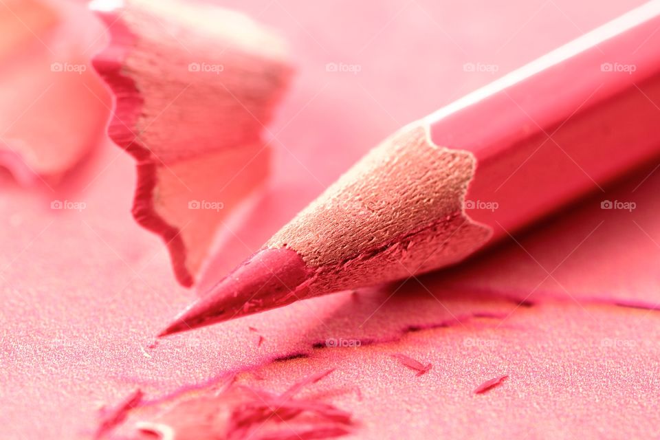 Red shaved pink pencil
