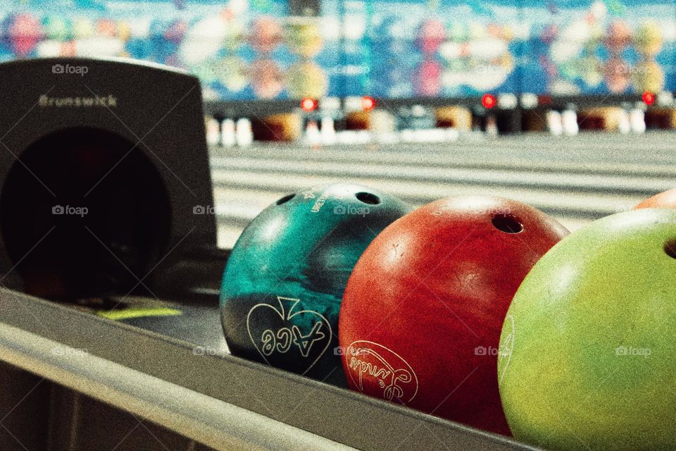 Colorful bowling balls at a bowling alley