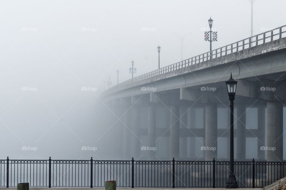 Bridge in the Morning Fog. Granada Bridge in Ormond Beach, Florida, gets lost in the fog.