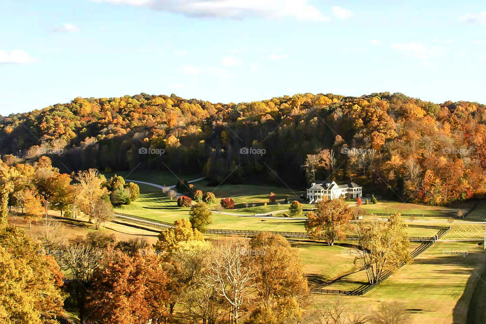 rural farm house with mountain background