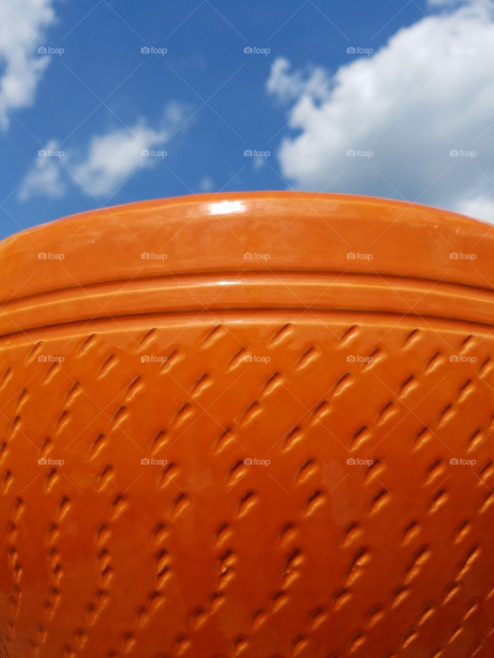 big orange pot in the sky