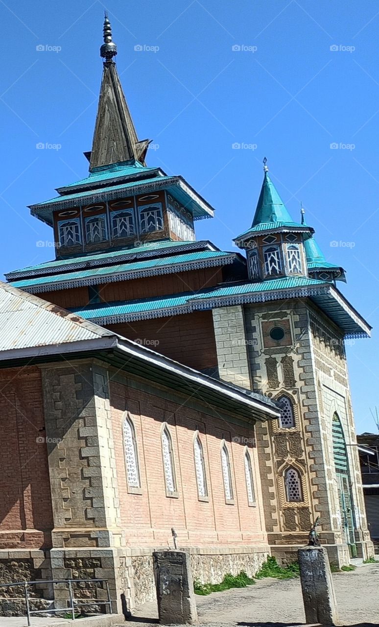 A beatiful n heart touching Front Part of "Jamiya Masjid" Shopian (Kashmir) depicting state of Art Stone work, Brick work, Wood work etc such a long time back