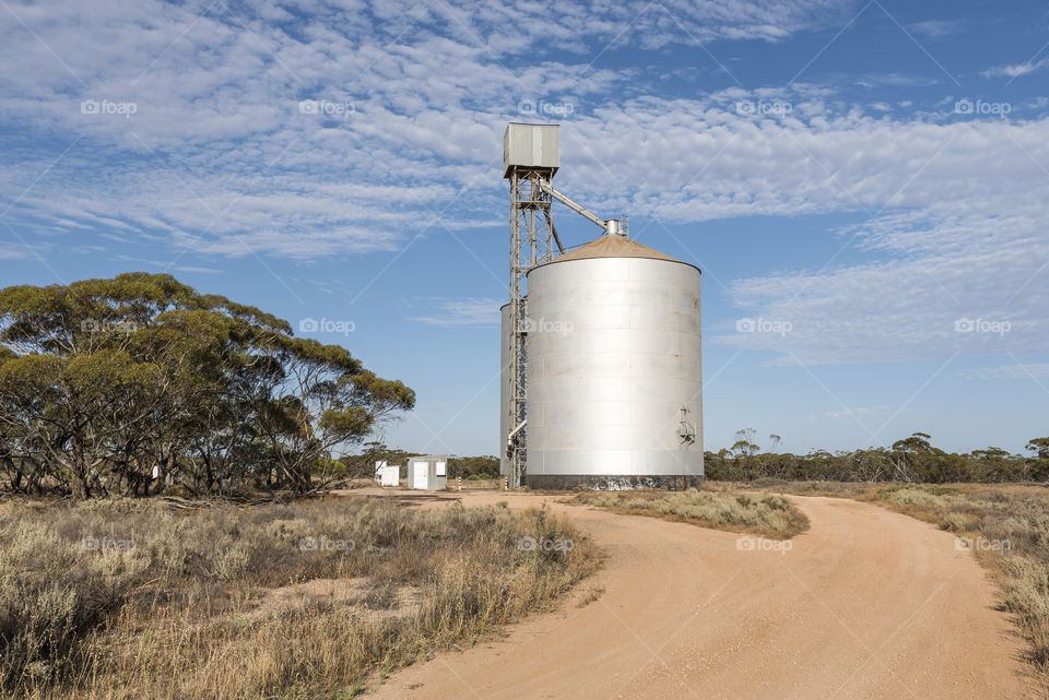 Australian farming land  with wheat silo.