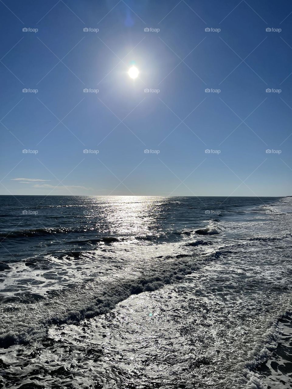 Gorgeous Sun reflecting on Atlantic Ocean waves