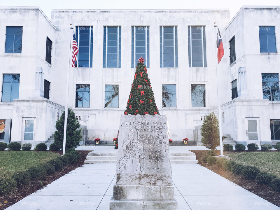 Symmetrical courthouse during Christmas holidays.