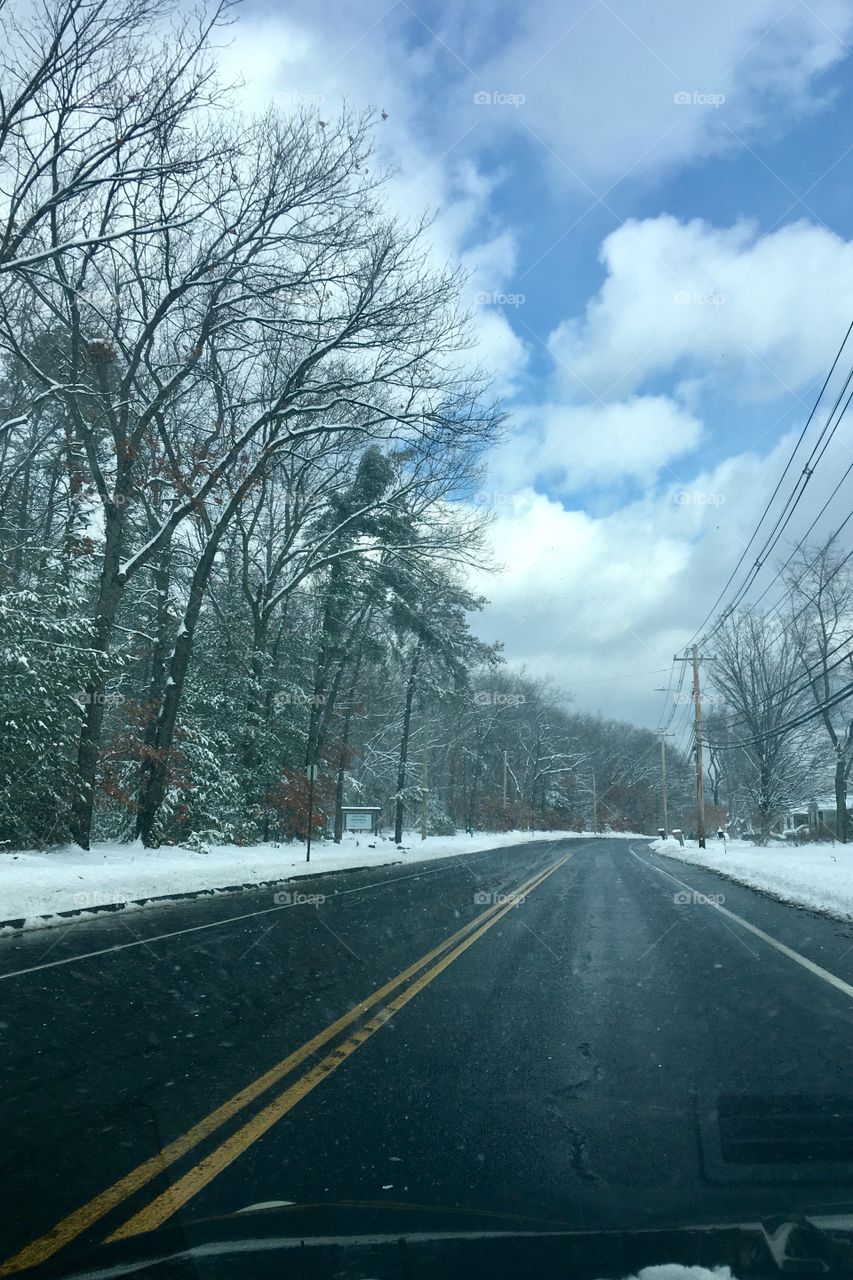 Open road after a New England snow fall. 