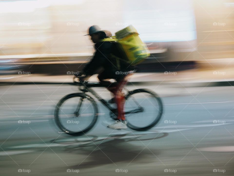 Men on a bicycle, long exposure 