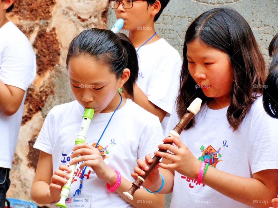 Students play the recorders