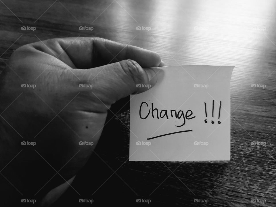 Motivational quotes on a small piece of paper