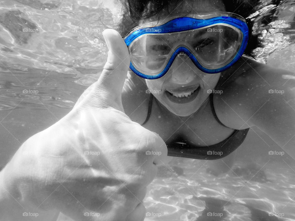 woman with blue mask. woman underwater wearing blue diving  mask,selective color