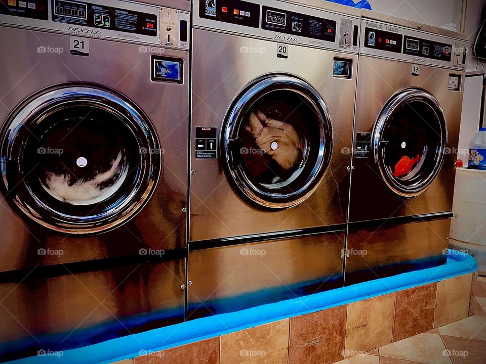 Washing machines at the Long Island City’s “Laundry City” on 48th St off Vernon Jackson Ave in Queens, NY. I like the way the metallic surfaces reflect images at varying gradations. 2020. Hypnotic Productions