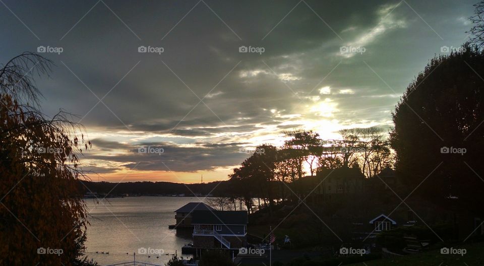 "Just Ducky". I took this pic of the sunrise on Lake Hopatcong in New Jersey on 11/7/2015.The ducks were an added bonus.