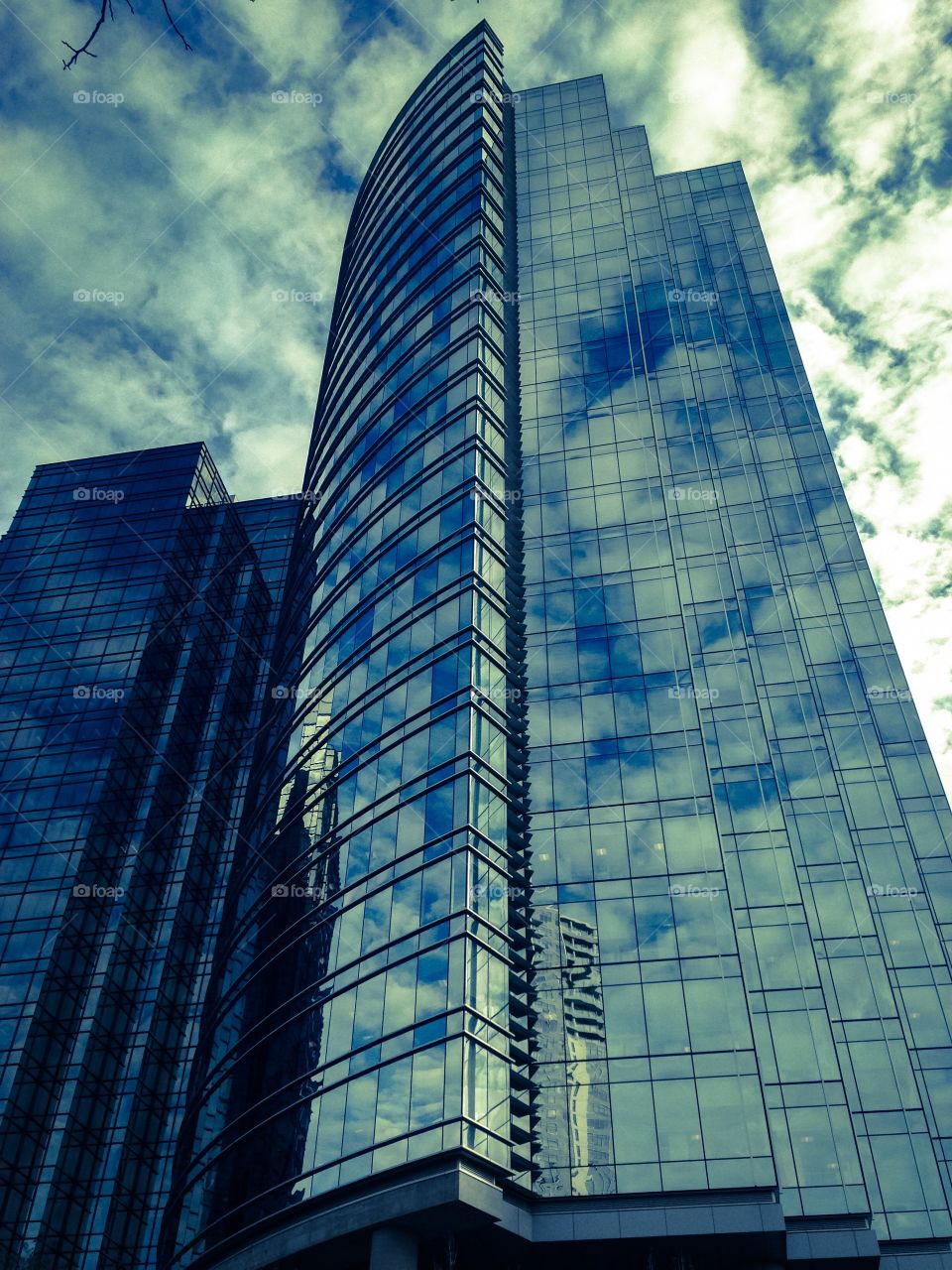 Glass building cloud reflection 