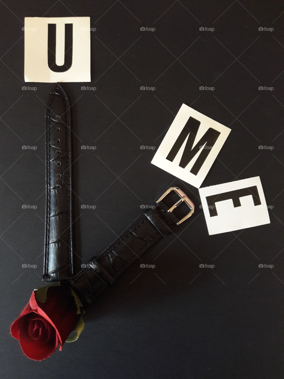 U and me text against black background