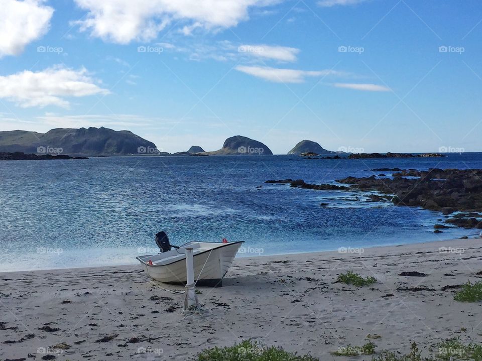 Boat at idyllic beach