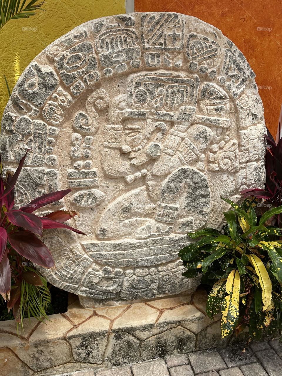 Stone carving in Cozumel