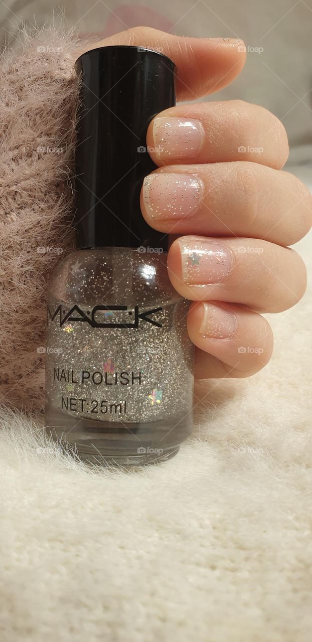 maintenance of your nails, with specific care, with a beautiful shine that highlights the beauty of your hands. glitter nail polish