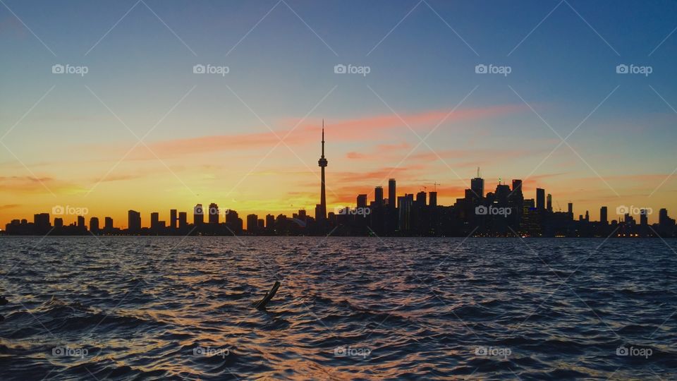 Beautiful sunset over Toronto skyline 
