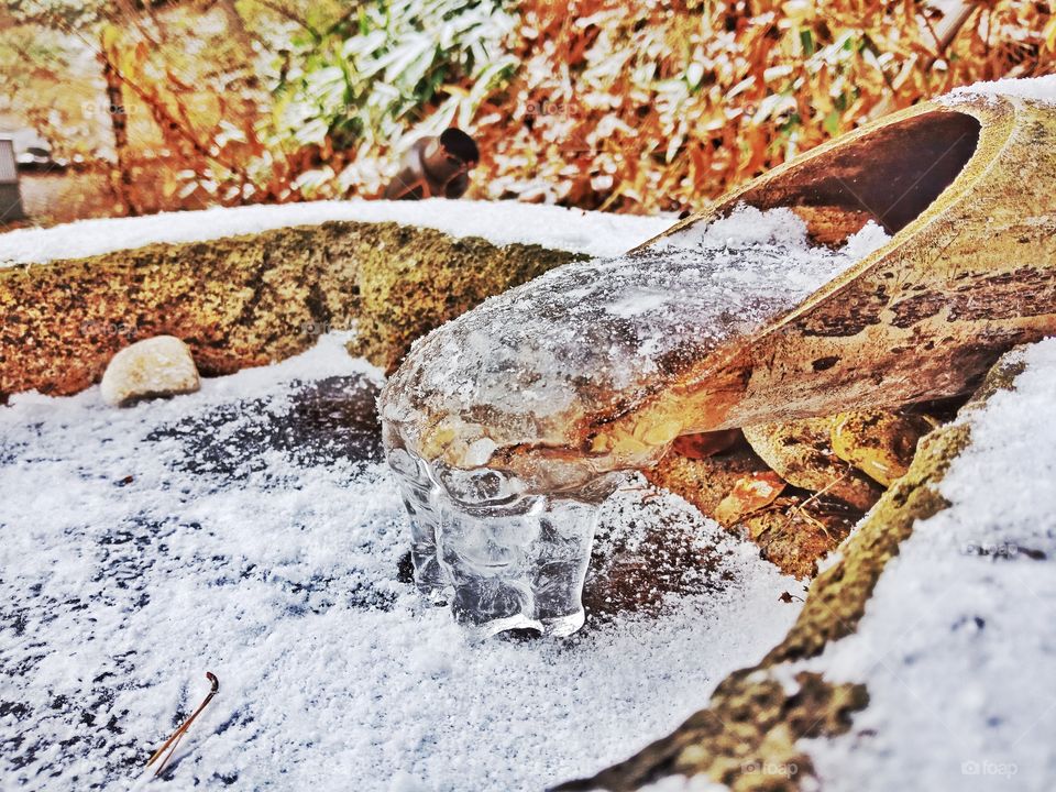 Frozen water in winter at Kusatsu onsen, Japan
