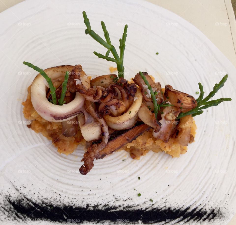 Seafood, squid with seaweed at the Amante Ibiza Restaurant, Spain