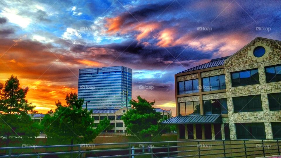 Buildings against dramatic sky