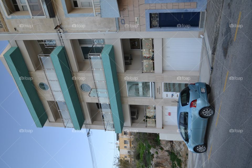 Houses and car in Malta