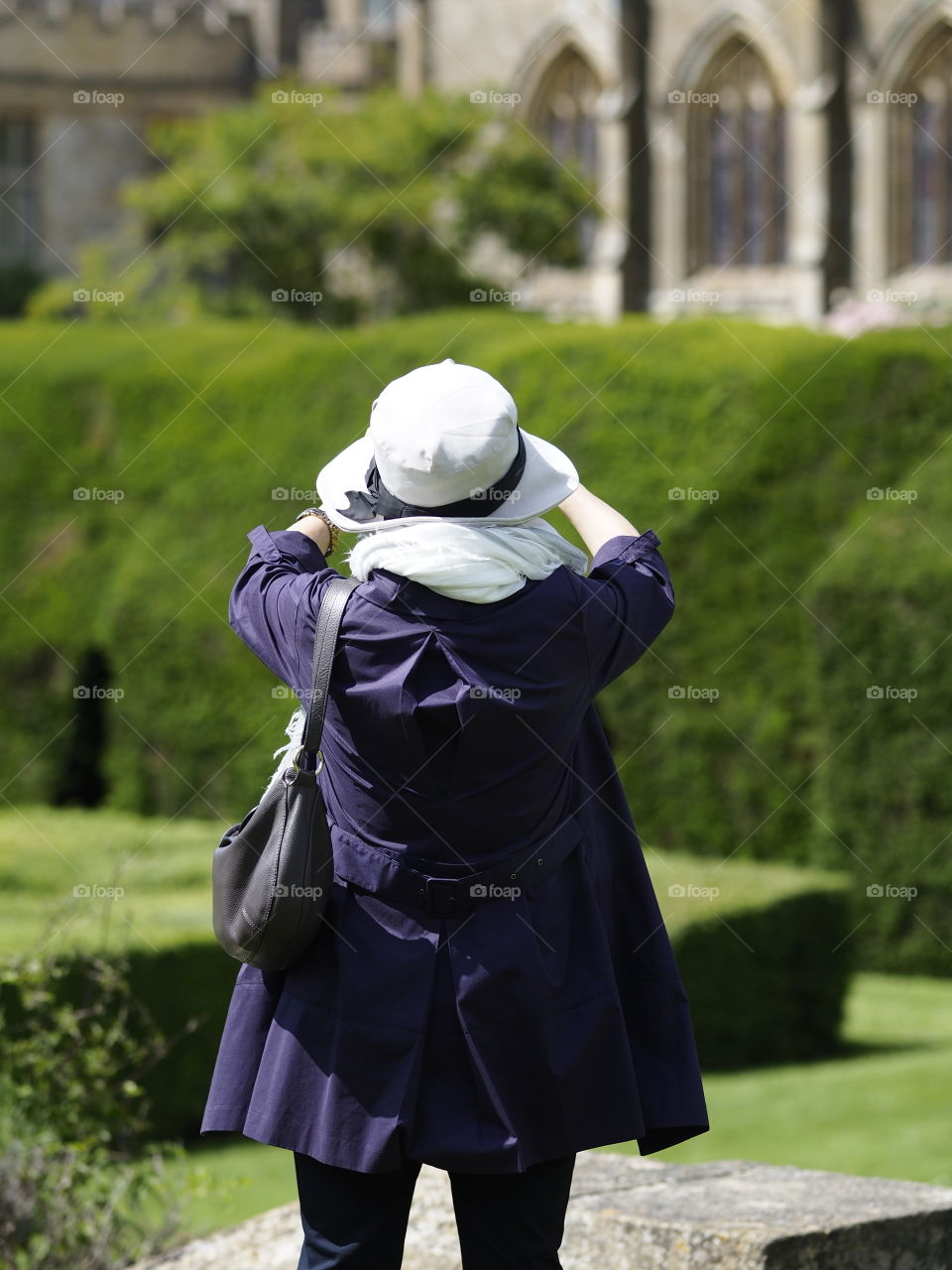 Woman . Taking photograph 