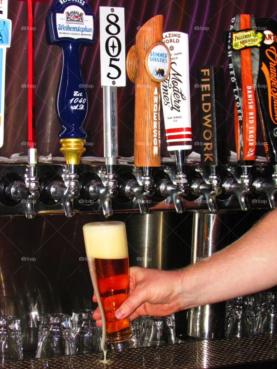 beer glass with lots of head