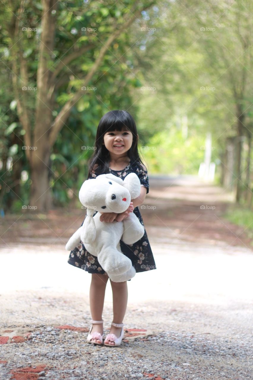 A girl and dog doll.