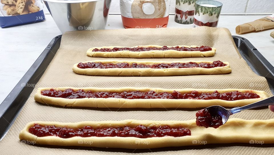 Making raspberry jam cookies for Santa 