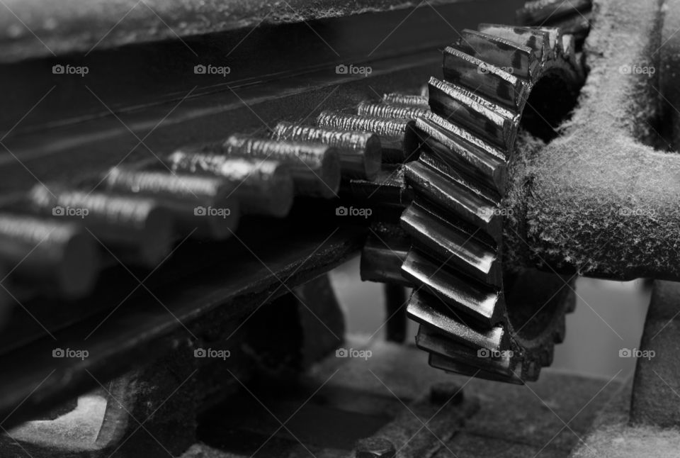 Greasy cogwheel in black and white