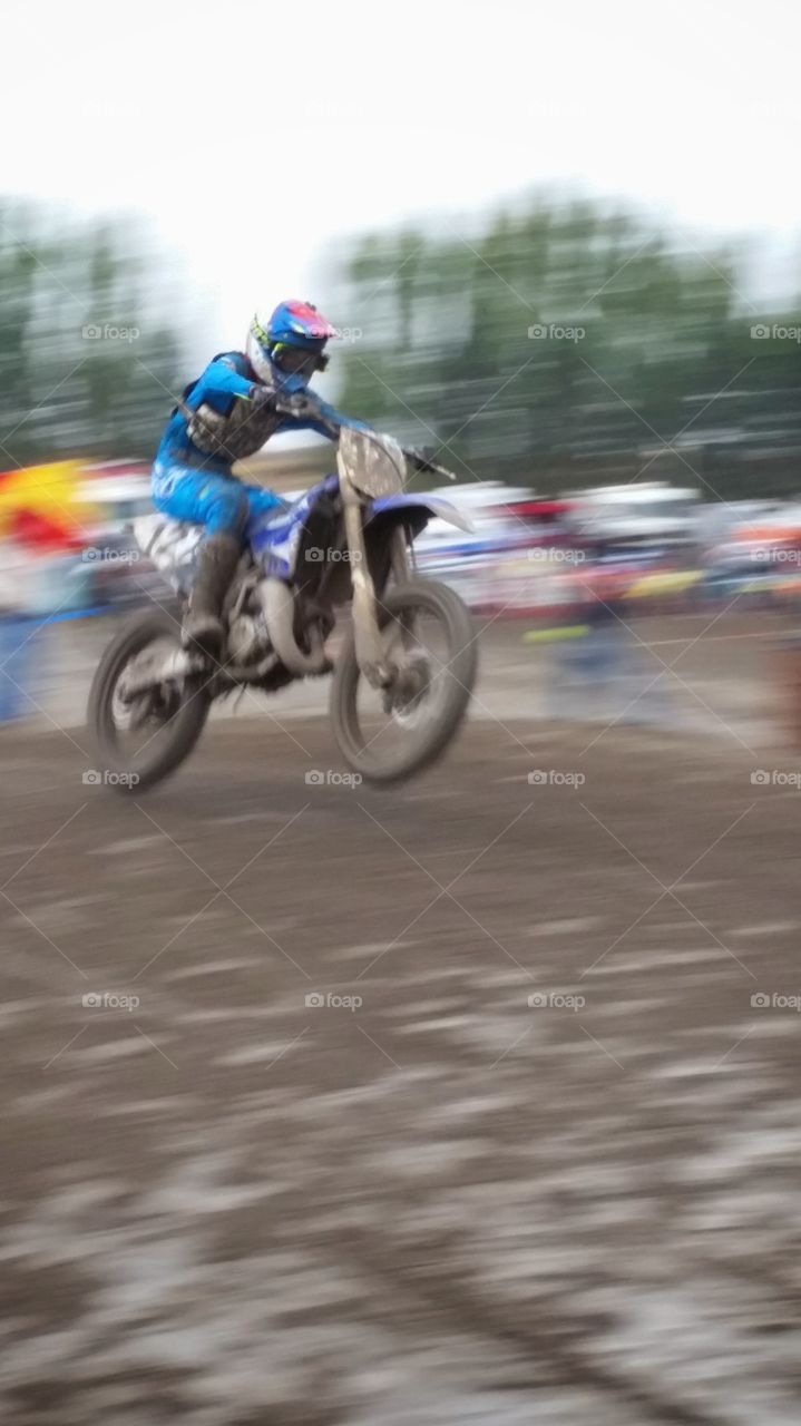 Dirt Bike Motorcycle Racing on Outdoor Sunny Track